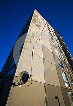 Ex-soviet concrete block houses in eastern-europe with satellite dish