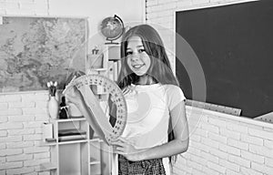 exact sciences. child hold protractor ruler. back to school. formal education in modern life. home schooling. childhood