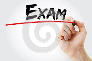 Exam text with marker, education concept background