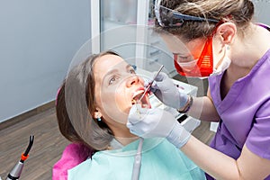 Examination oral cavity or treatment teeth, visiting dental office
