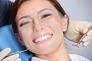 Examination of the teeth in the office of the dentist