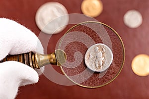 Examining Roman silver coin