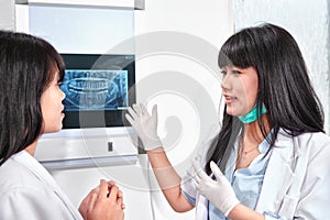 Examining teeth X Ray