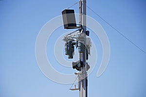 An example of installation on a street lighting pole of sound and light equipment, a wi-fi router and a surveillance camera