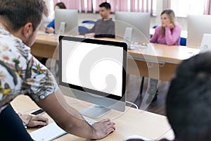 Exams Preparation. Group Of Multi-Ethnic Students Studying Together inside computer lab while helping each other