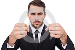 Exasperated businessman with clenched fists