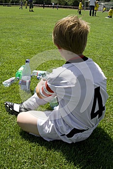 Exausted boy takes a rest