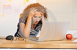 Exausted woman at the office