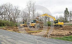 Excavated Construction Site with Heavy Machinery