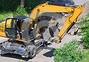 Excavating machine on construction site