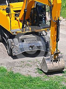 Excavating machine on construction site