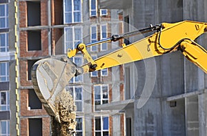 Excavating machine on construction site