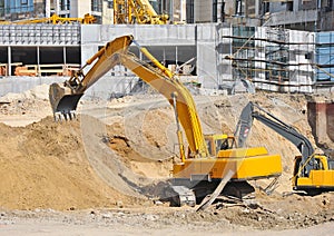 Excavating machine on construction site