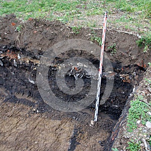 Excavation of a excavation pit for a residential building on a f