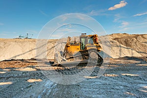 Excavation site with construction machine