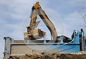 excavator backhoe loading dump truck construction site hydraulic shovel heavy lorry