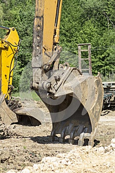 Excavator bucket and arm