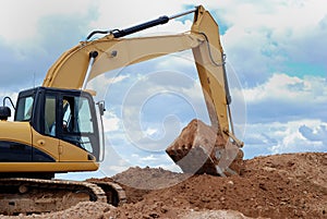 Excavator bulldozer loader in sandpit