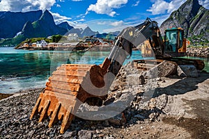 Excavator, bulldozer repair work on the road. Norway