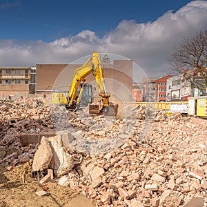 Excavator in construction in city