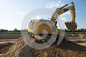 Excavator on construction of new highway