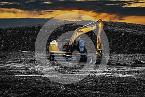 Excavator at construction site. Earth-Moving Heavy Equipment