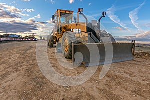 Excavator at a construction site, performing earth moving work