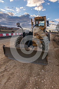 Excavator at a construction site, performing earth moving work