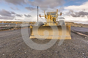 Excavator on the construction works of a highway