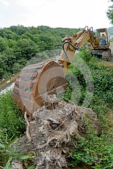 Excavator in country