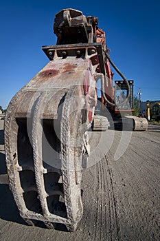 Excavator with Crusher Attachment