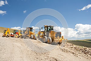 Excavator, digger, earthmover at construction site