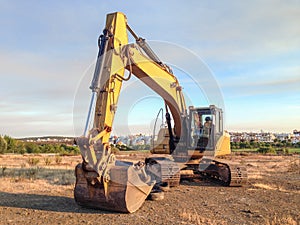 Excavator digger parked on a building site