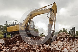 Excavator Digging In The Ground