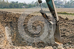 excavator digging making pond. earthmoving work