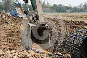excavator digging making pond. earthmoving work