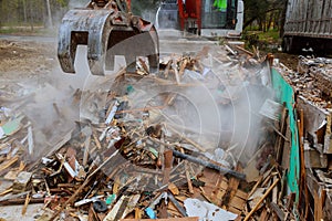 excavator disassembles broken house after tragedy