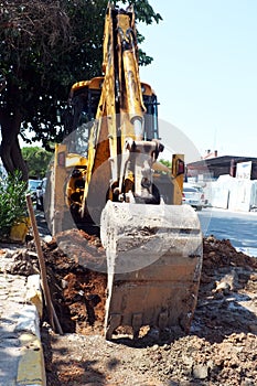Excavator doing roadwork