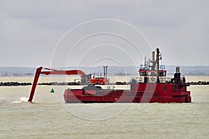 An excavator on a dredging ship
