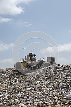 Excavator At Dumping Ground