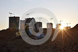 Excavator on earthworks at construction site.