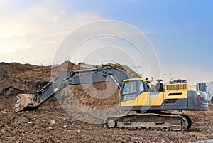 Excavator on earthworks at construction site