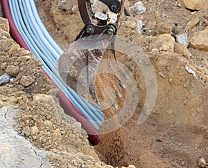 Excavator electrical conduits