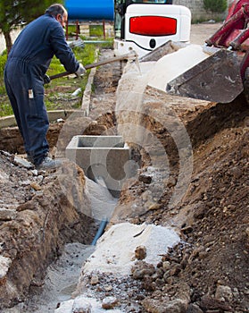 Excavator electrical conduits covered
