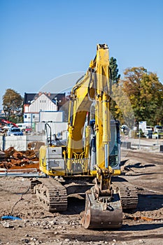 Excavator - focus on the arm and bucket.