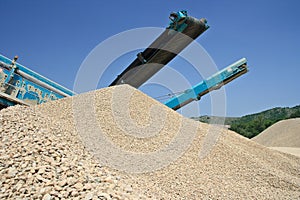 Excavator in a gravel pit