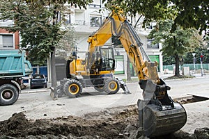 Excavator, hydraulics, tires, screws