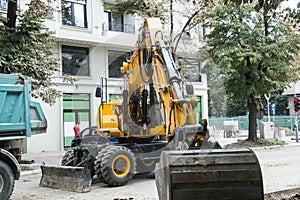 Excavator, hydraulics, tires, screws