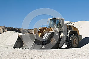 Excavator in a limestone quarry