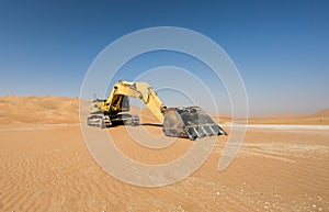 Excavator in Liwa desert